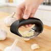Just use the hand-operated garlic press to crush the garlic. It's easy to use and clean. It's a practical kitchen gadget